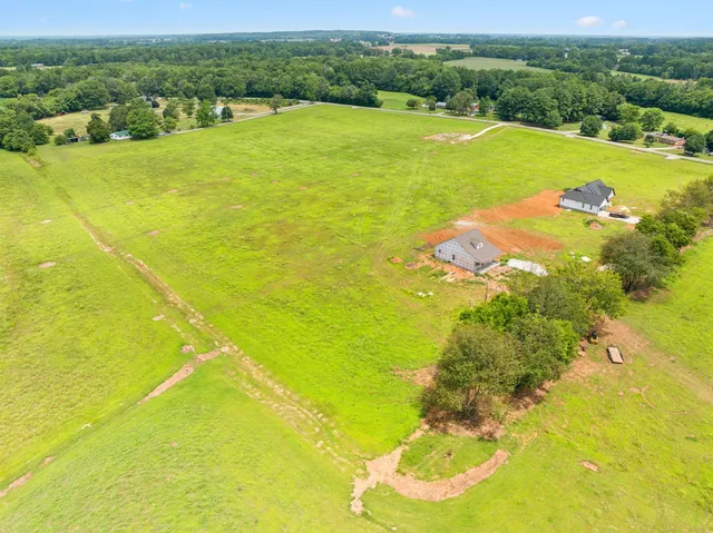 a view of an ocean and a yard