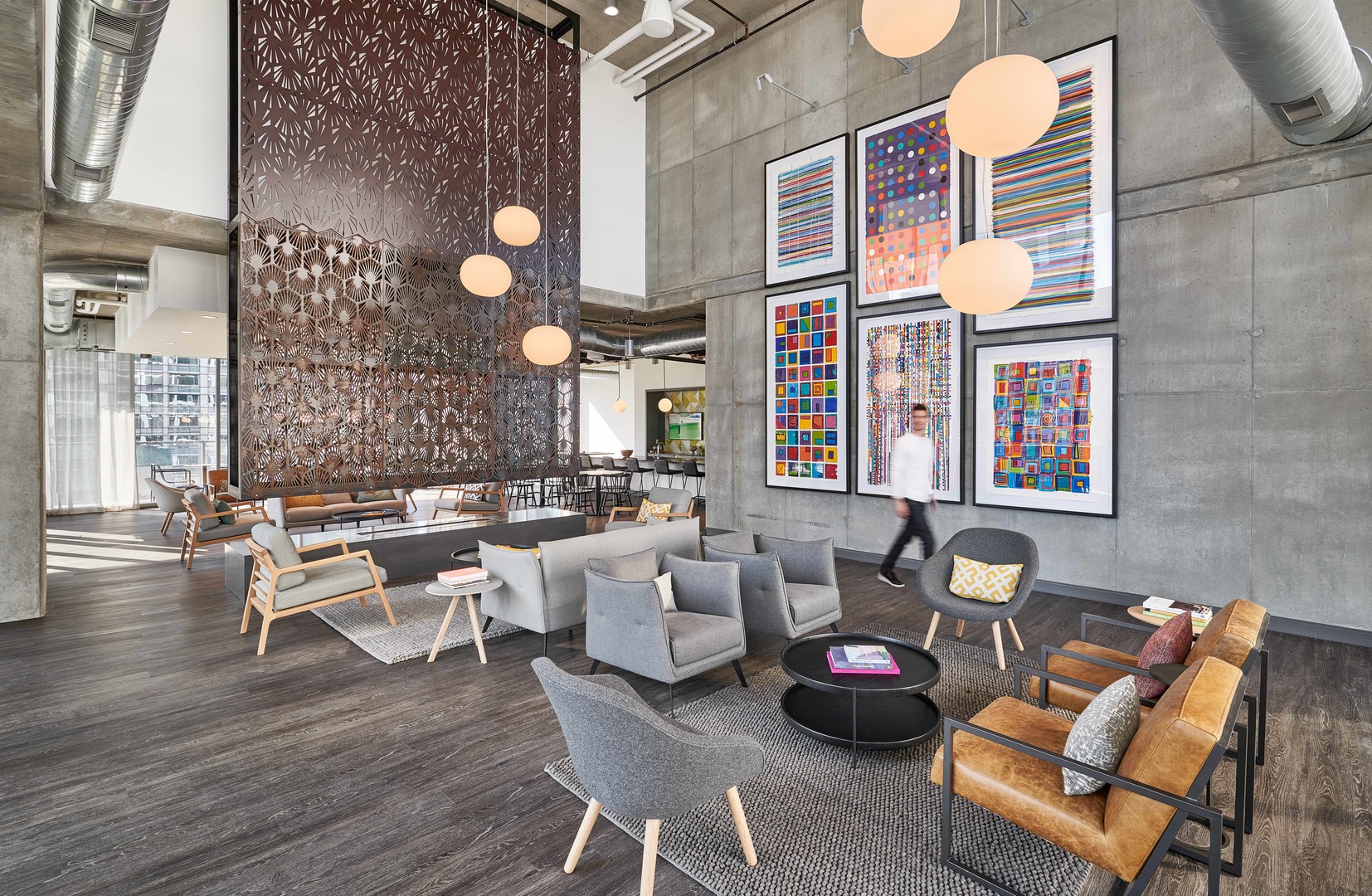 60 East Randolph Street, Unit 23B Chicago, IL 60601 - Photo 21 of 27 a living room with furniture and wooden floor