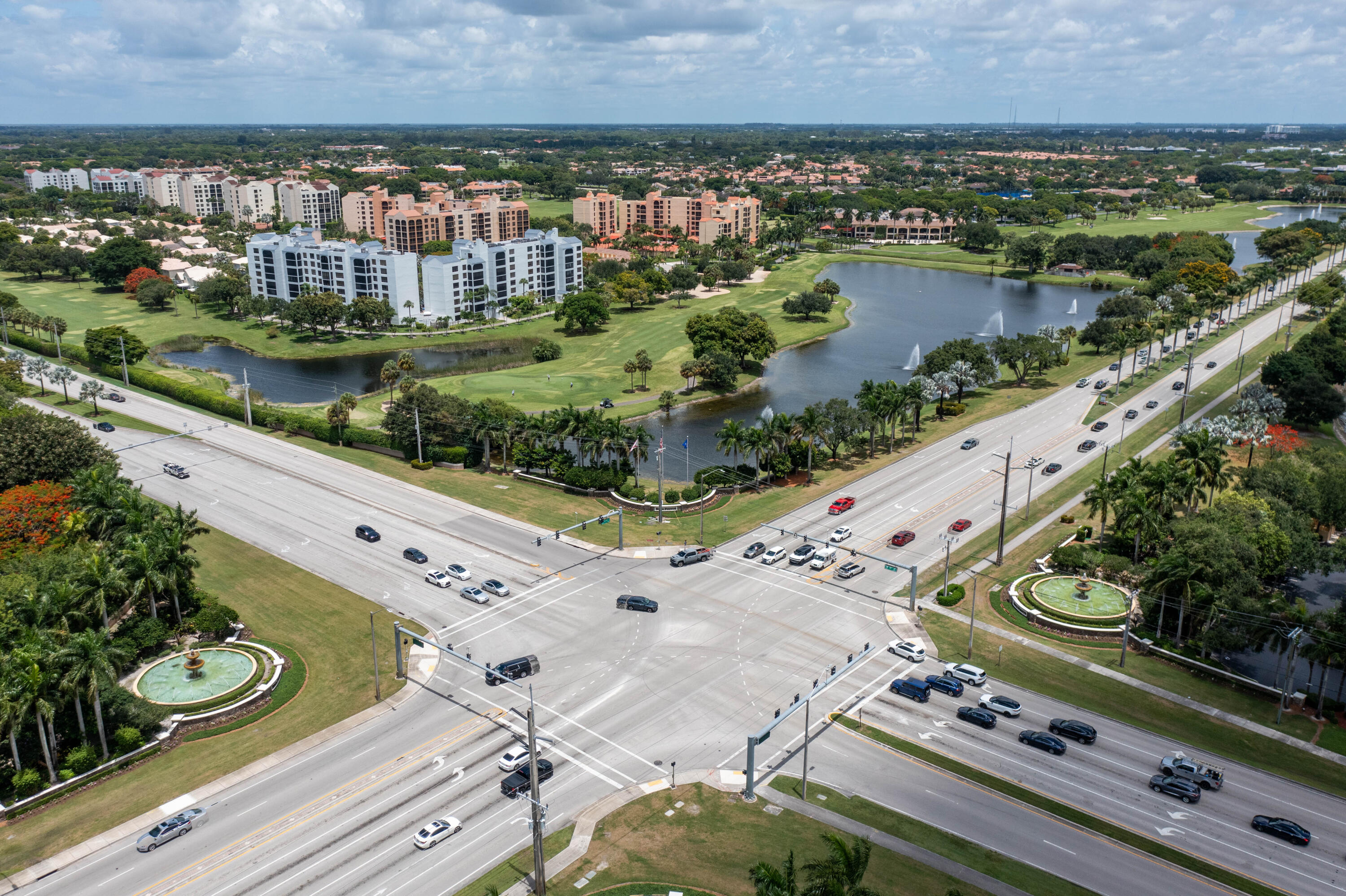 7520 La Paz Boulevard, Unit 104 Boca Raton, FL 33433 - Photo 48 of 56 an aerial view of a city and lake view