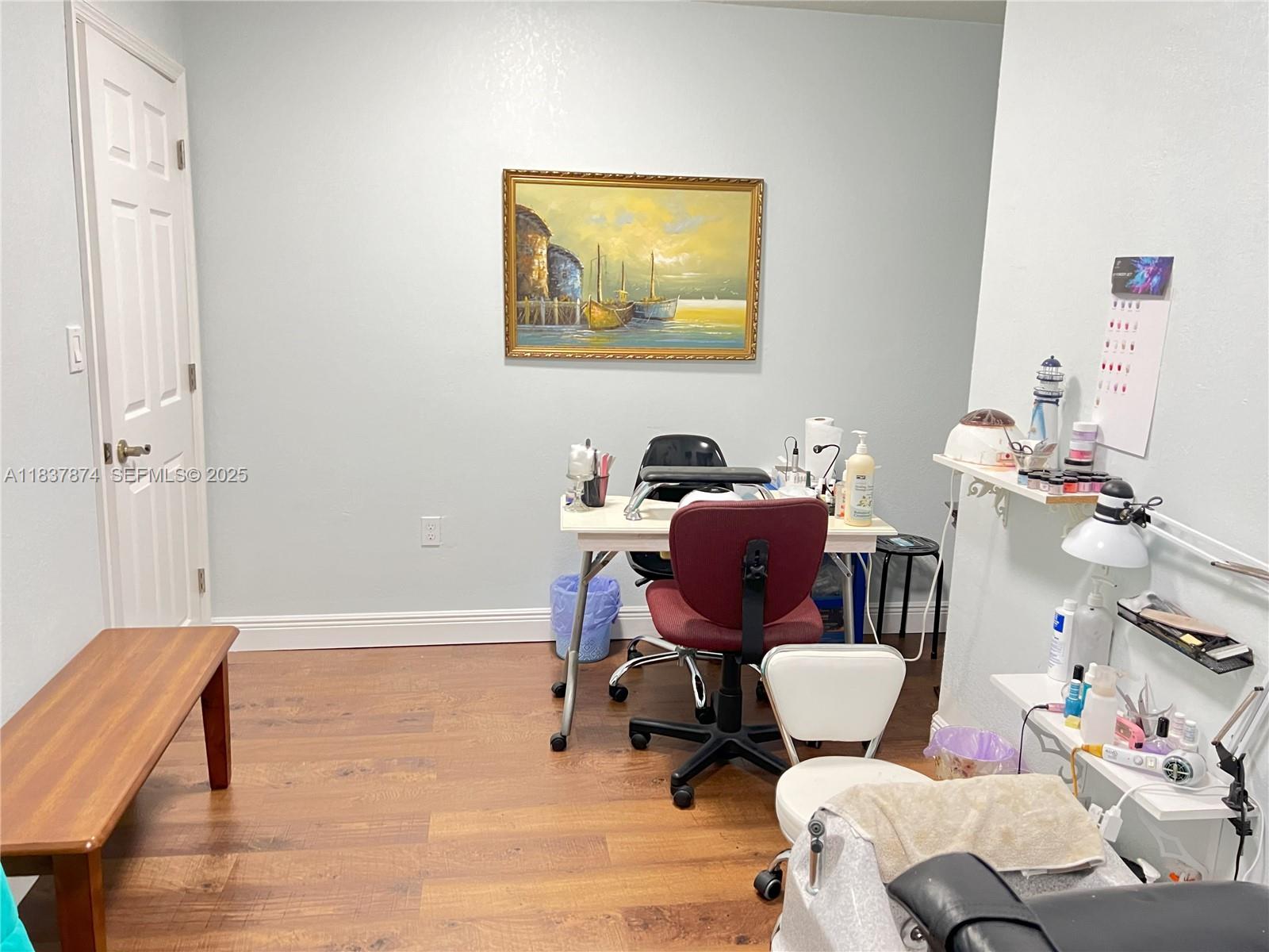 12554 Southwest 211th Terrace Miami, FL 33177 - Photo 26 of 30 a living room with furniture and a chair