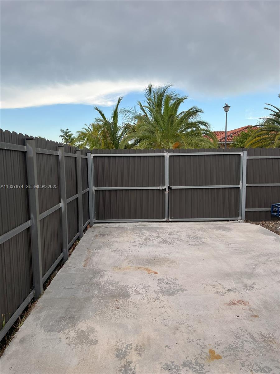 12554 Southwest 211th Terrace Miami, FL 33177 - Photo 29 of 30 a view of a backyard