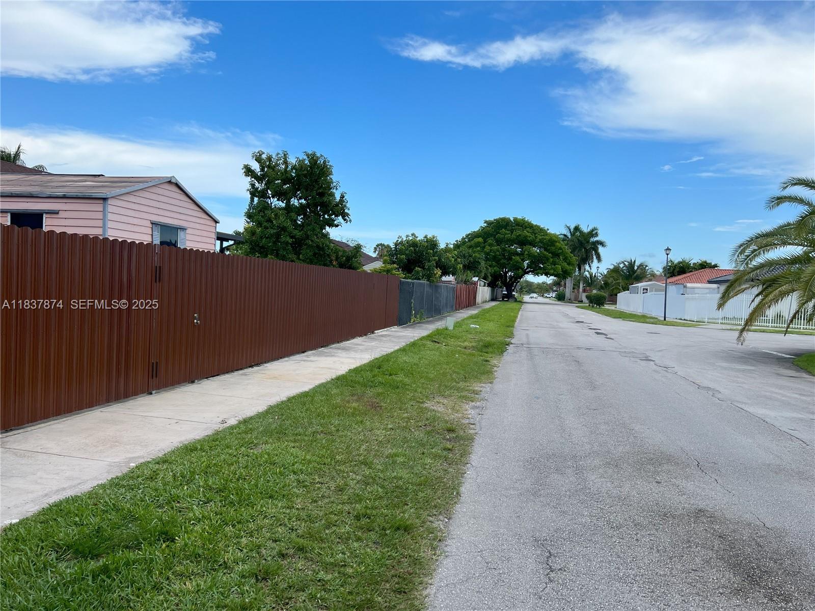 12554 Southwest 211th Terrace Miami, FL 33177 - Photo 5 of 30 a view of a backyard