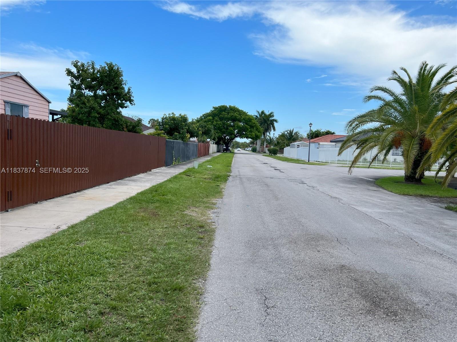 12554 Southwest 211th Terrace Miami, FL 33177 - Photo 6 of 30 a view of a backyard