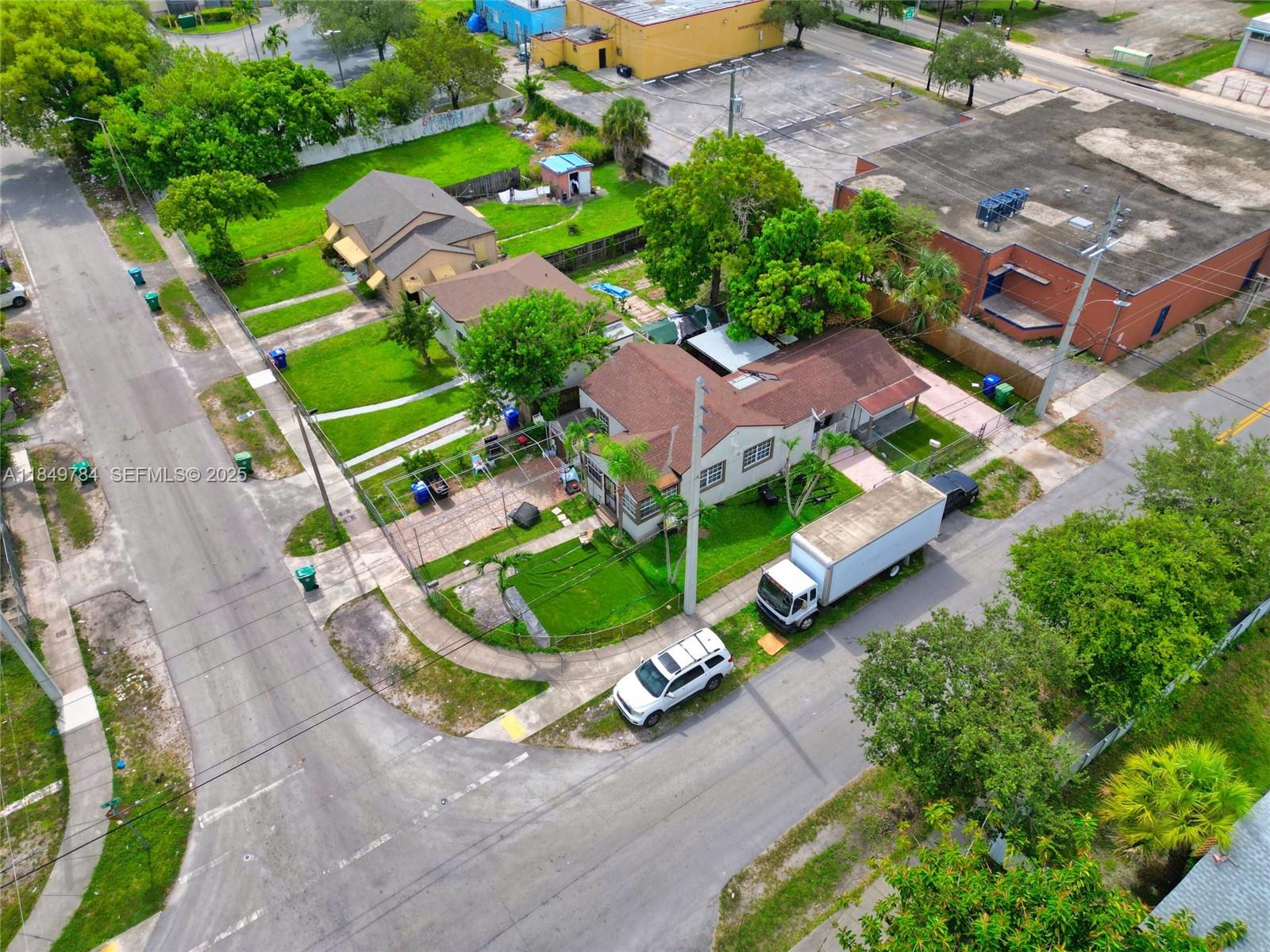 790 Northwest 63rd Street Miami, FL 33150 - Photo 24 of 35 an aerial view of residential houses with outdoor space