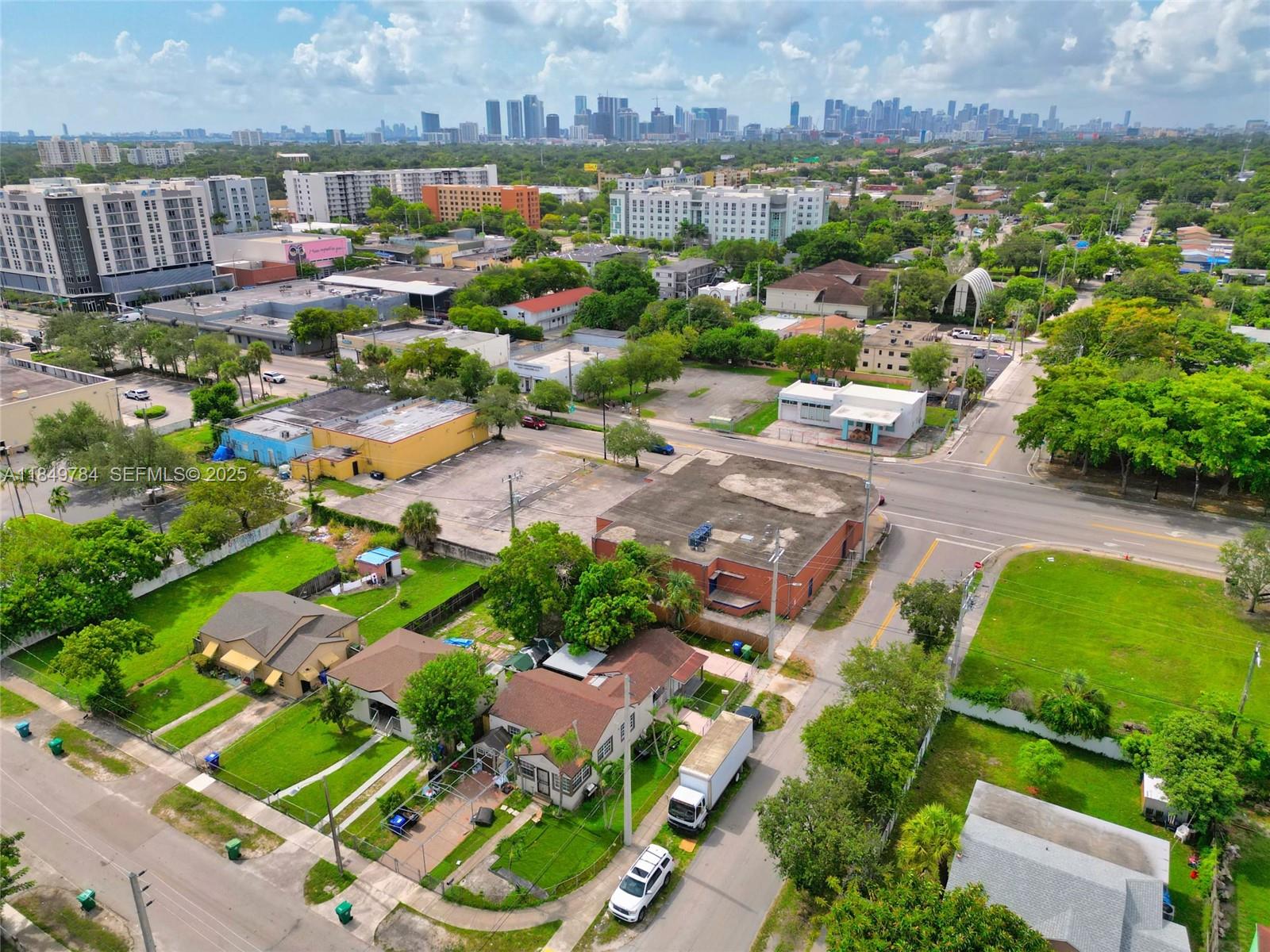 790 Northwest 63rd Street Miami, FL 33150 - Photo 30 of 35 an aerial view of residential houses with outdoor space and river view