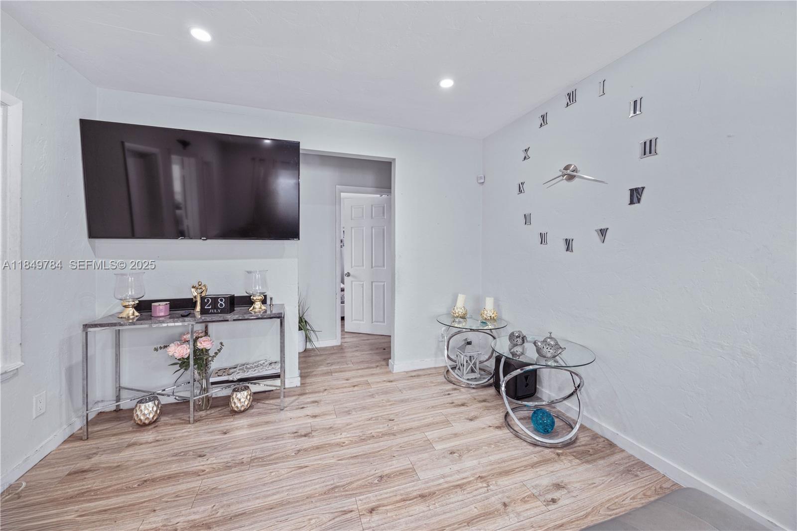 790 Northwest 63rd Street Miami, FL 33150 - Photo 7 of 35 a living room with furniture