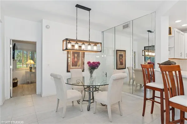 $64,000 | 7048 Pelican Bay Boulevard, Unit C105, Naples, FL 34108