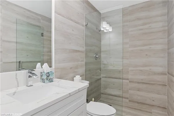 $64,000 | 7048 Pelican Bay Boulevard, Unit C105, Naples, FL 34108