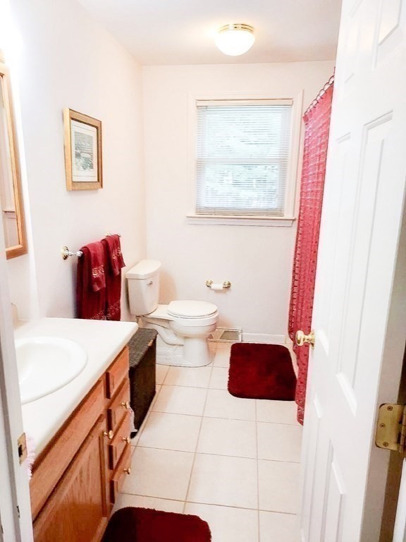 37 Heritage Road Billerica, MA 01821 - Photo 16 of 24 a bathroom with a sink a toilet and a shower