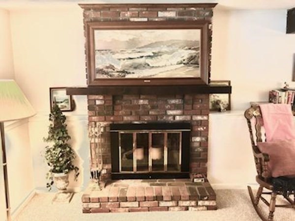 37 Heritage Road Billerica, MA 01821 - Photo 20 of 24 a view of fireplace and window