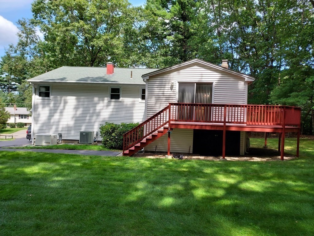37 Heritage Road Billerica, MA 01821 - Photo 3 of 24 a view of a house with a house and a yard