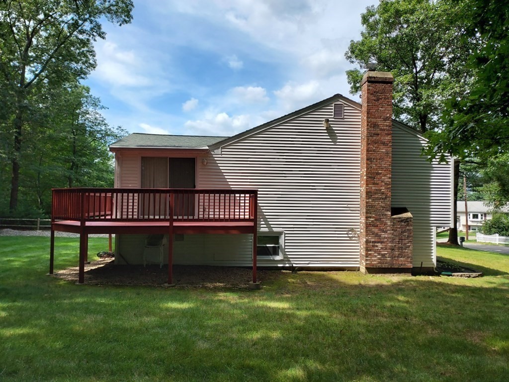 37 Heritage Road Billerica, MA 01821 - Photo 5 of 24 a view of a house with a yard