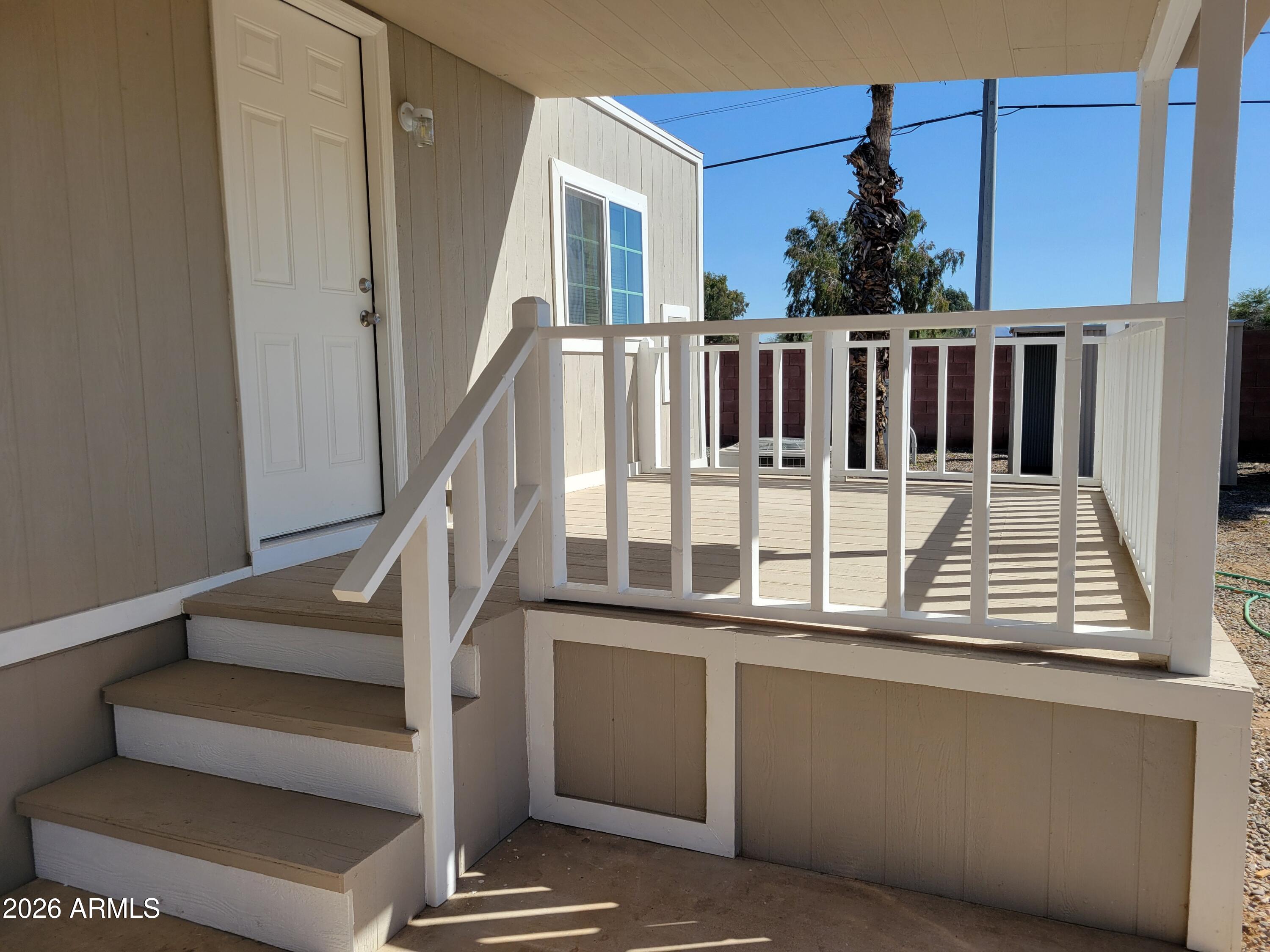18026 North Cave Creek Road, Unit 1 Phoenix, AZ 85032 - Photo 13 of 14 a view of entryway with wooden floor and a front door