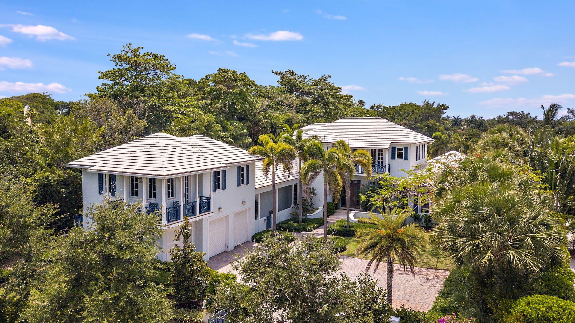 1222 North Ocean Boulevard Gulf Stream, FL 33483 - Photo 1 of 61 a front view of a house with a yard and fountain