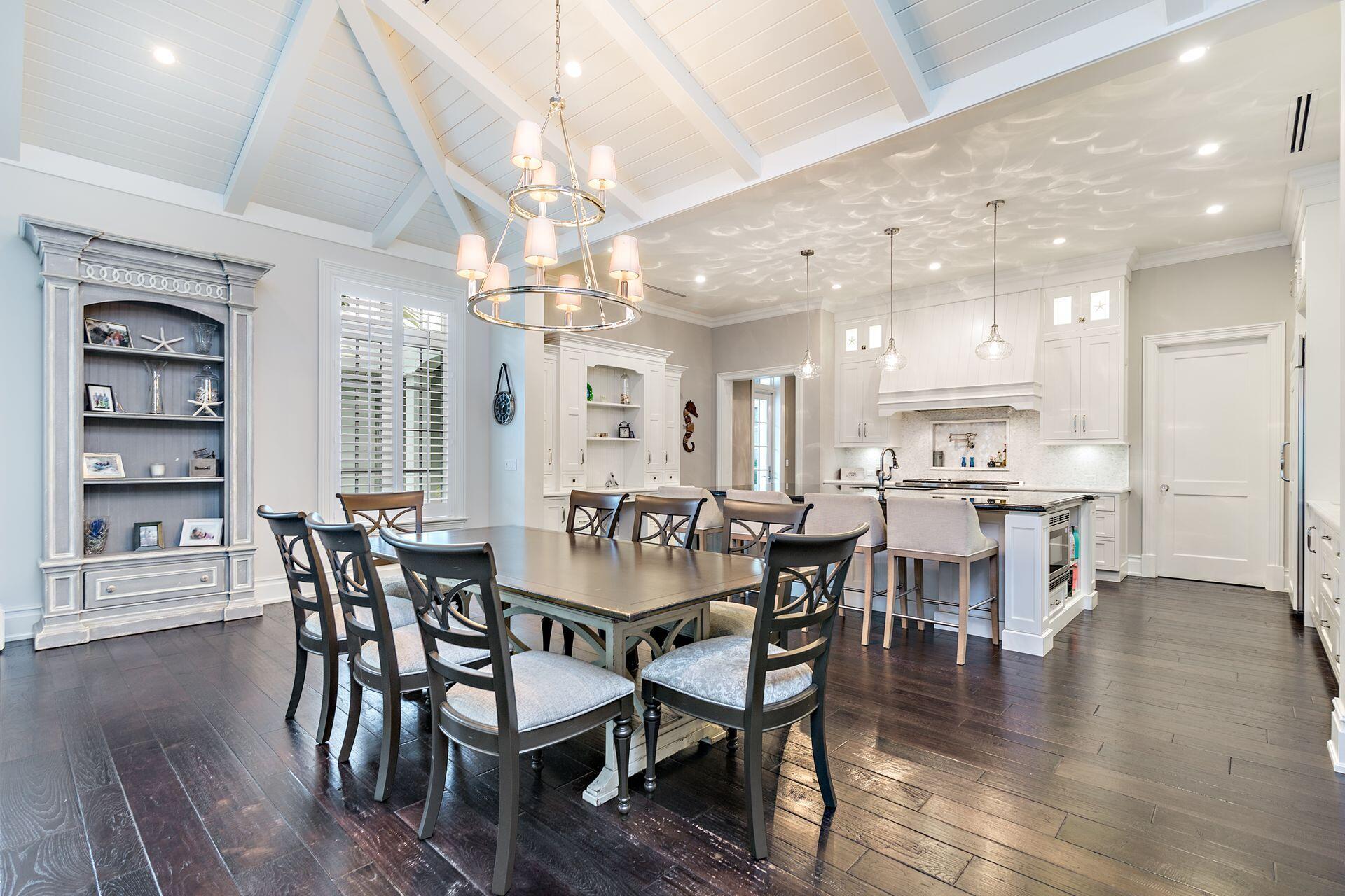 1222 North Ocean Boulevard Gulf Stream, FL 33483 - Photo 11 of 61 a dining room with furniture and wooden floor