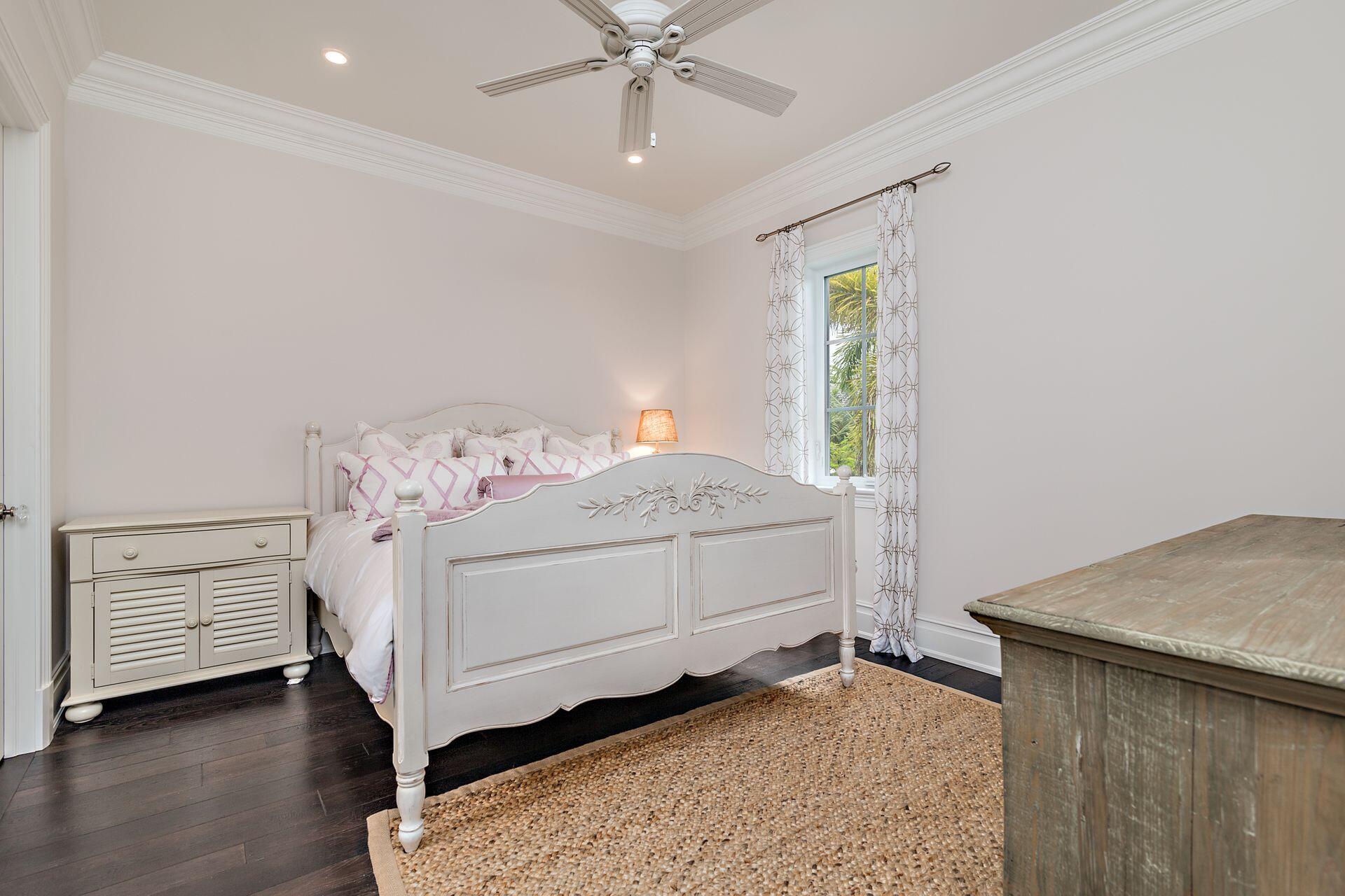 1222 North Ocean Boulevard Gulf Stream, FL 33483 - Photo 26 of 61 a bedroom with a bed and a dresser