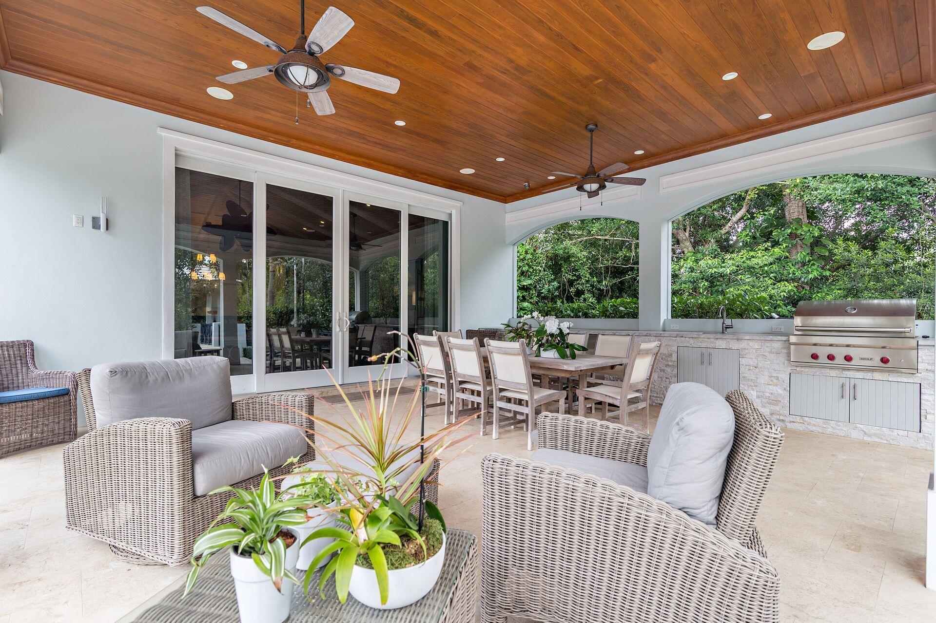 1222 North Ocean Boulevard Gulf Stream, FL 33483 - Photo 28 of 61 a outdoor living space with furniture and garden view