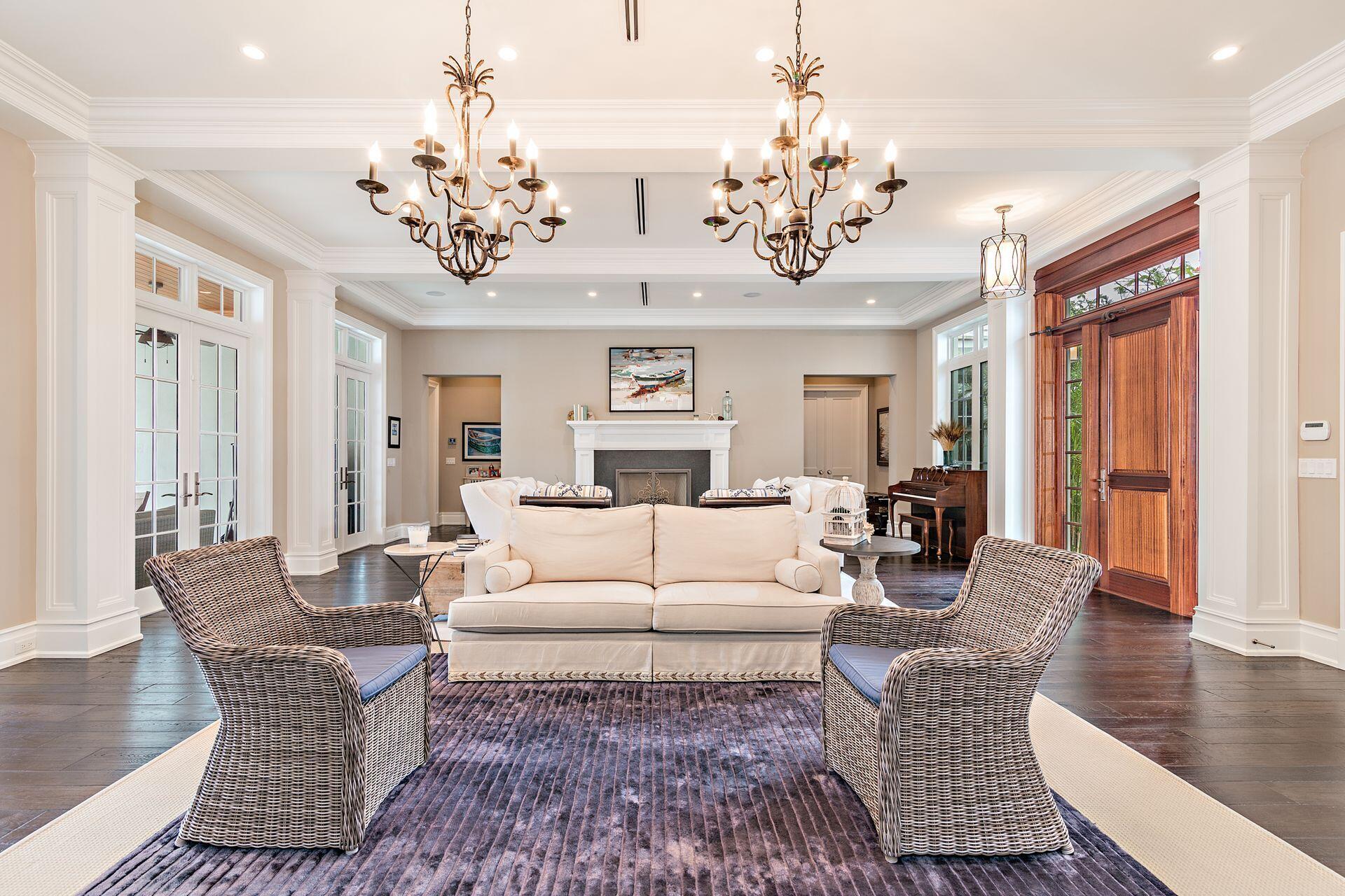 1222 North Ocean Boulevard Gulf Stream, FL 33483 - Photo 4 of 61 a living room with furniture chandelier and a chandelier