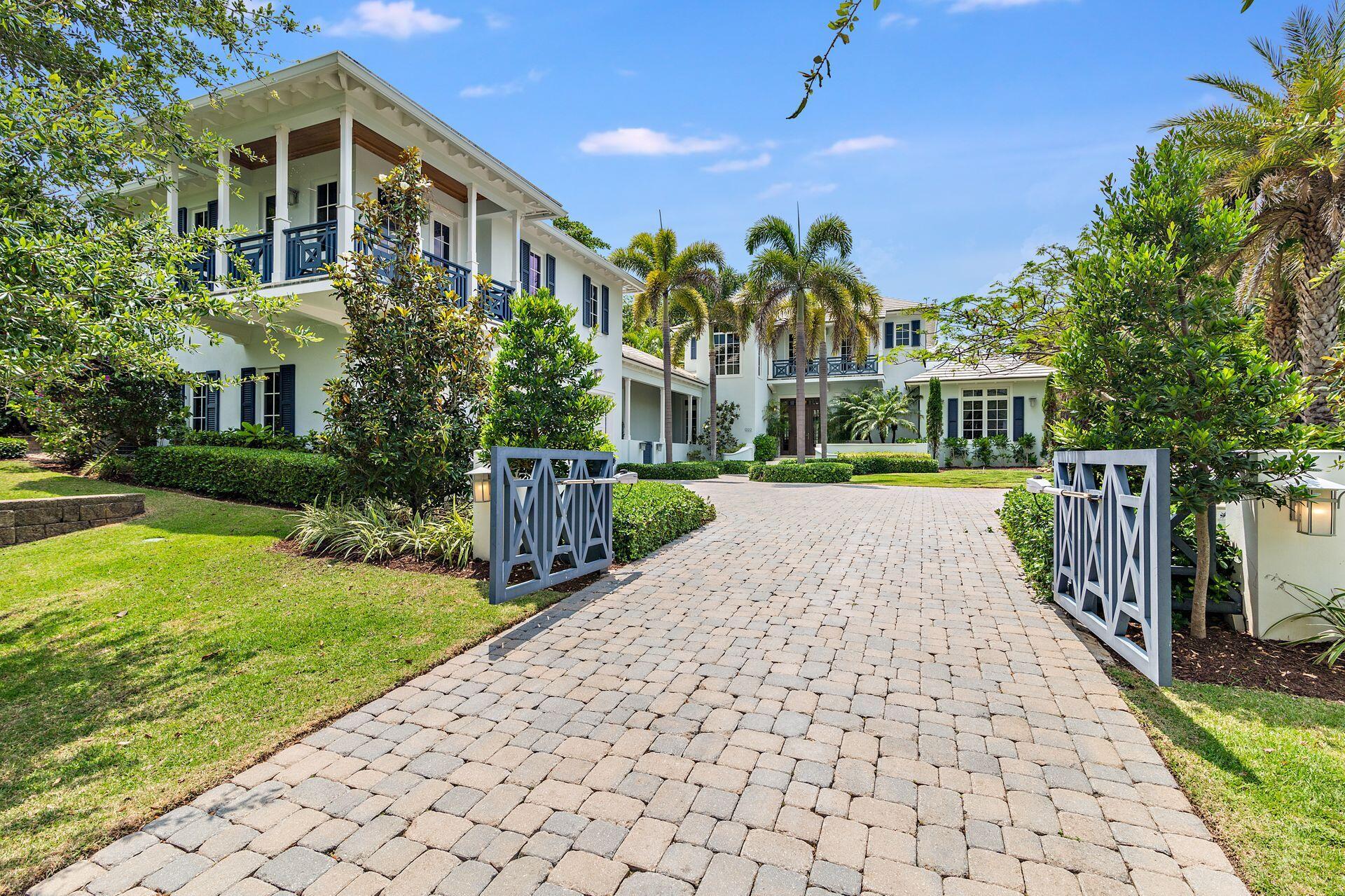 1222 North Ocean Boulevard Gulf Stream, FL 33483 - Photo 42 of 61 a view of a building with a yard