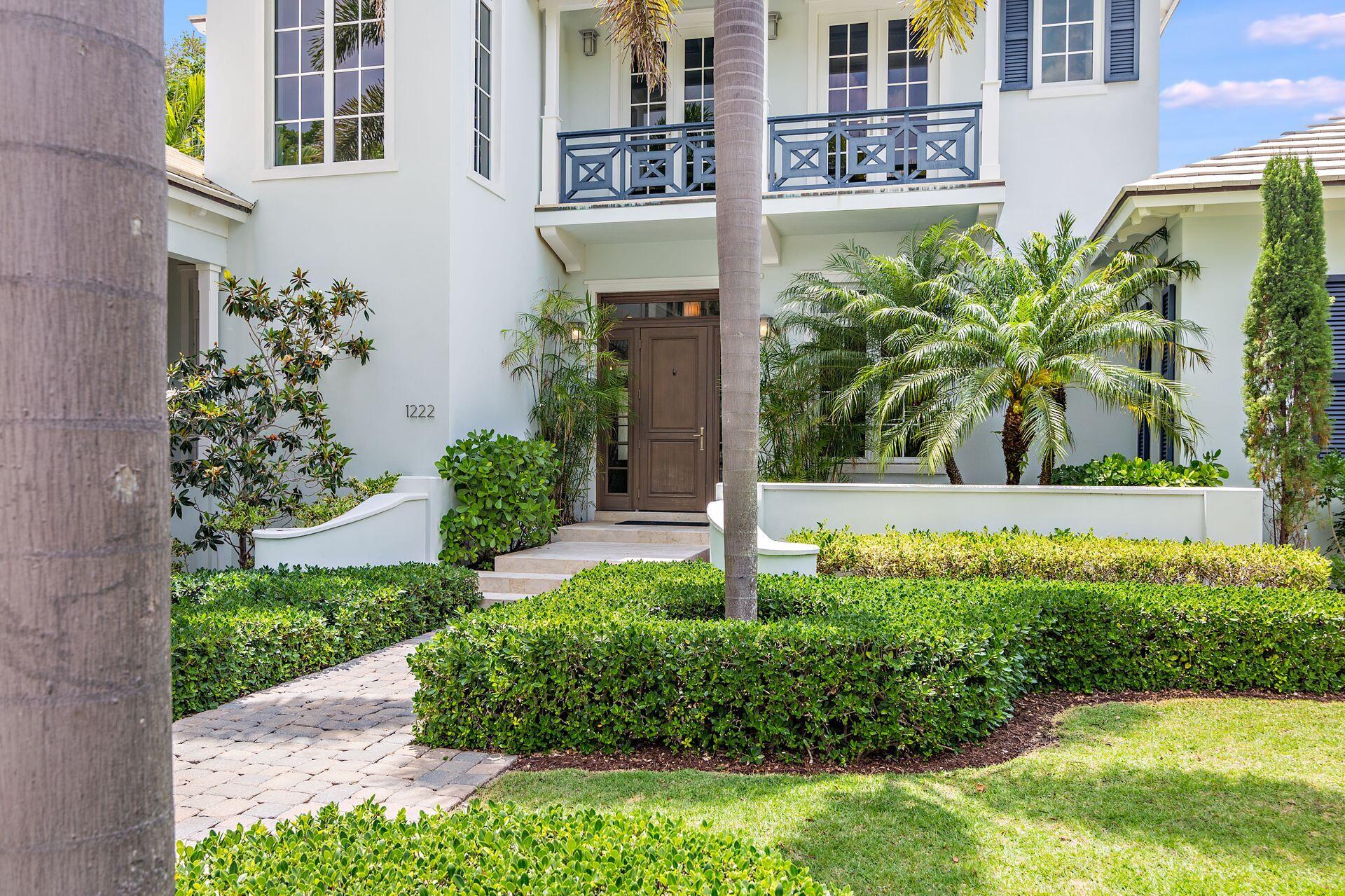 1222 North Ocean Boulevard Gulf Stream, FL 33483 - Photo 45 of 61 a view of a garden in front of a building