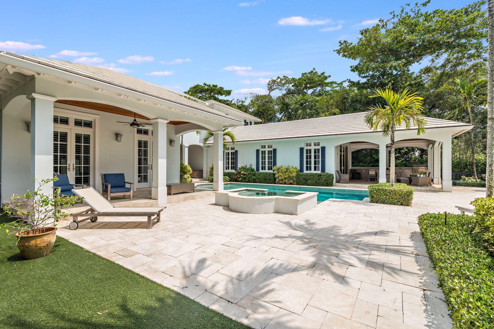 1222 North Ocean Boulevard Gulf Stream, FL 33483 - Photo 48 of 61 a view of house with swimming pool outdoor seating
