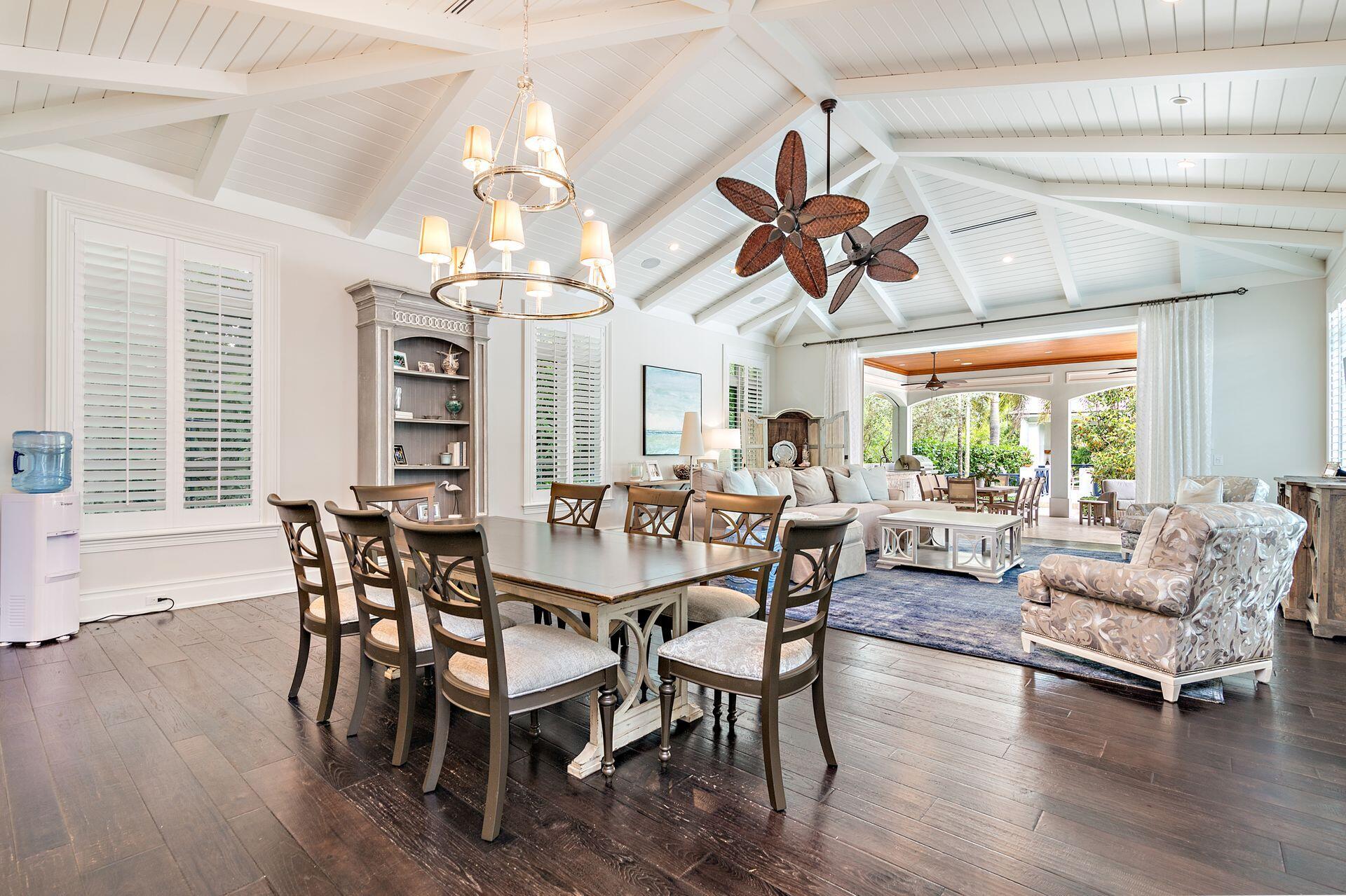 1222 North Ocean Boulevard Gulf Stream, FL 33483 - Photo 10 of 61 a view of a dining room with furniture window and wooden floor