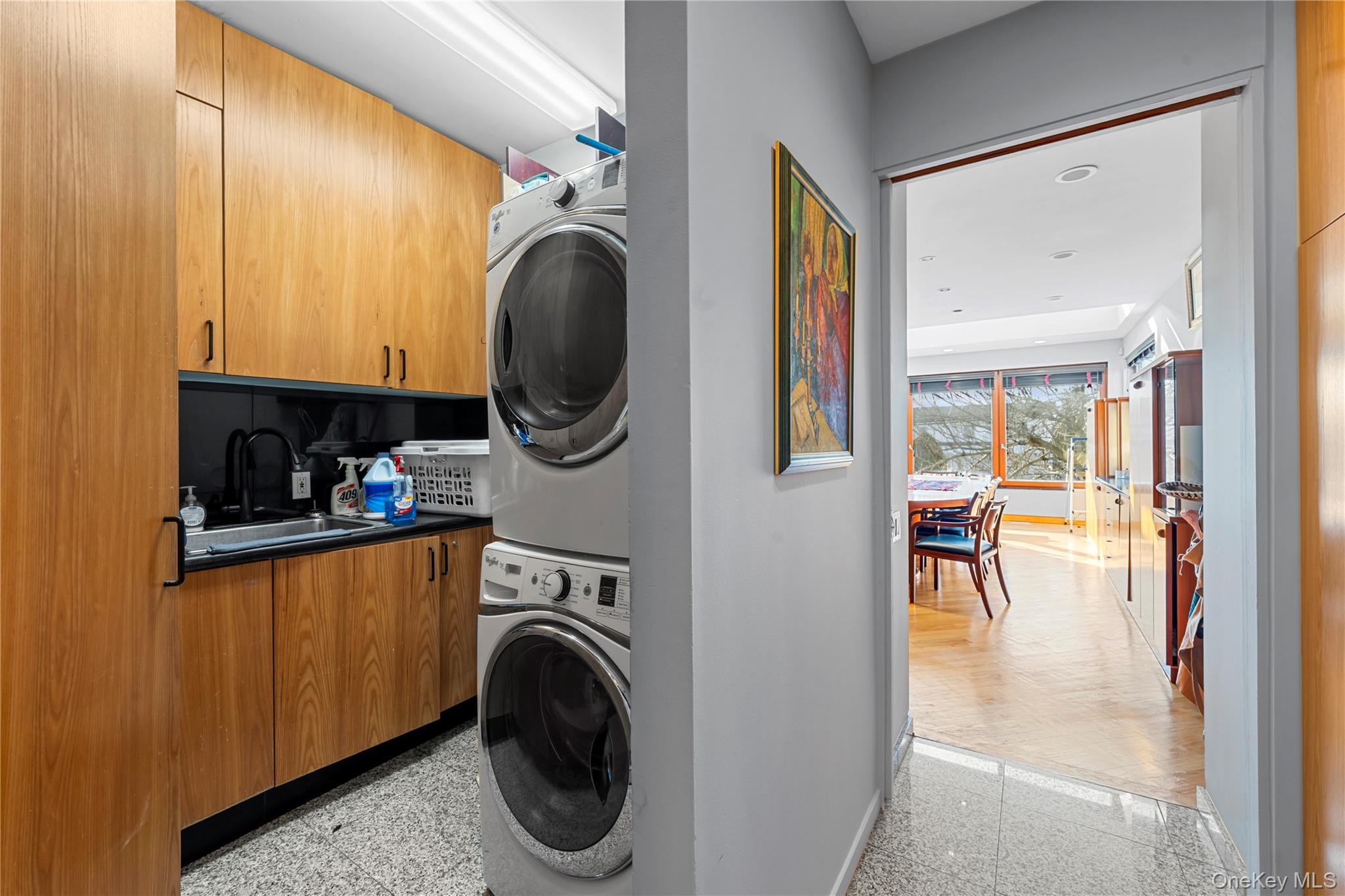 2829 Frankel Boulevard Merrick, NY 11566 - Photo 17 of 46 a view of a hallway with washer and dryer