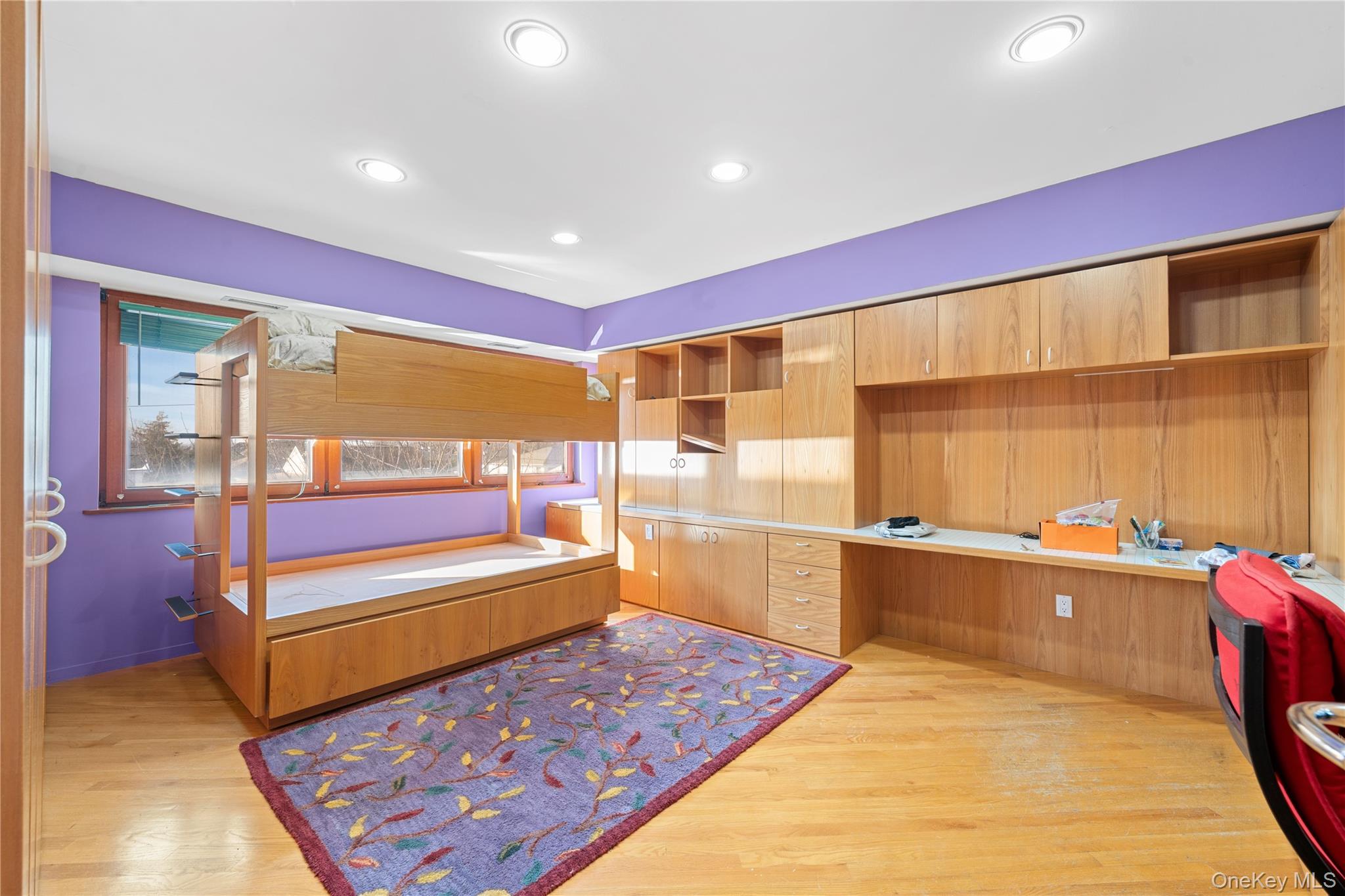 2829 Frankel Boulevard Merrick, NY 11566 - Photo 24 of 46 a room with wooden floor and furniture