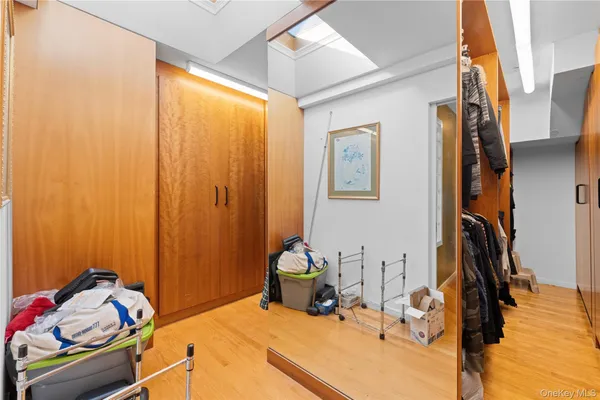a bathroom with a granite countertop sink toilet a shower and a mirror