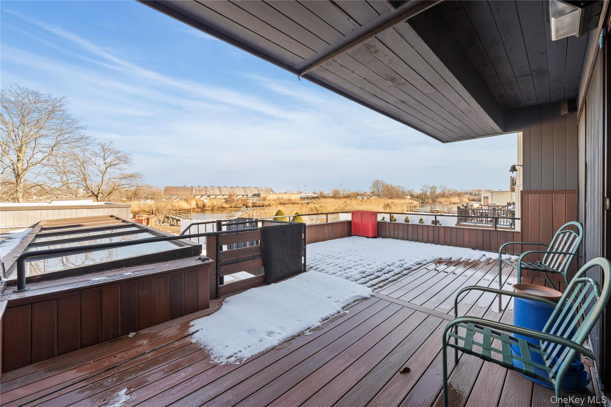 2829 Frankel Boulevard Merrick, NY 11566 - Photo 38 of 46 a view of a balcony with wooden floor