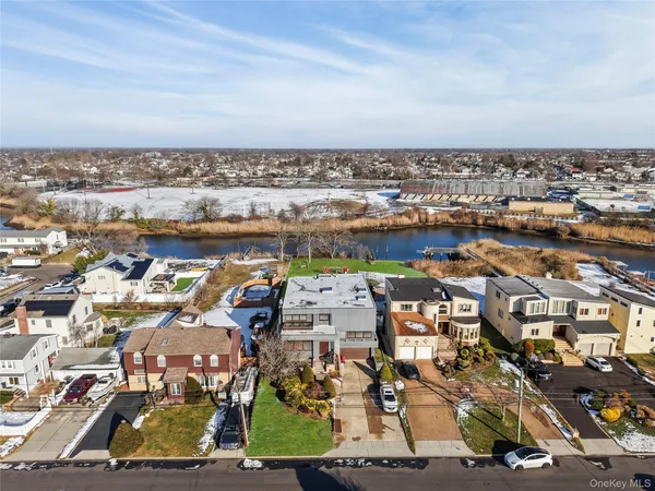 an aerial view of residential house with outdoor space