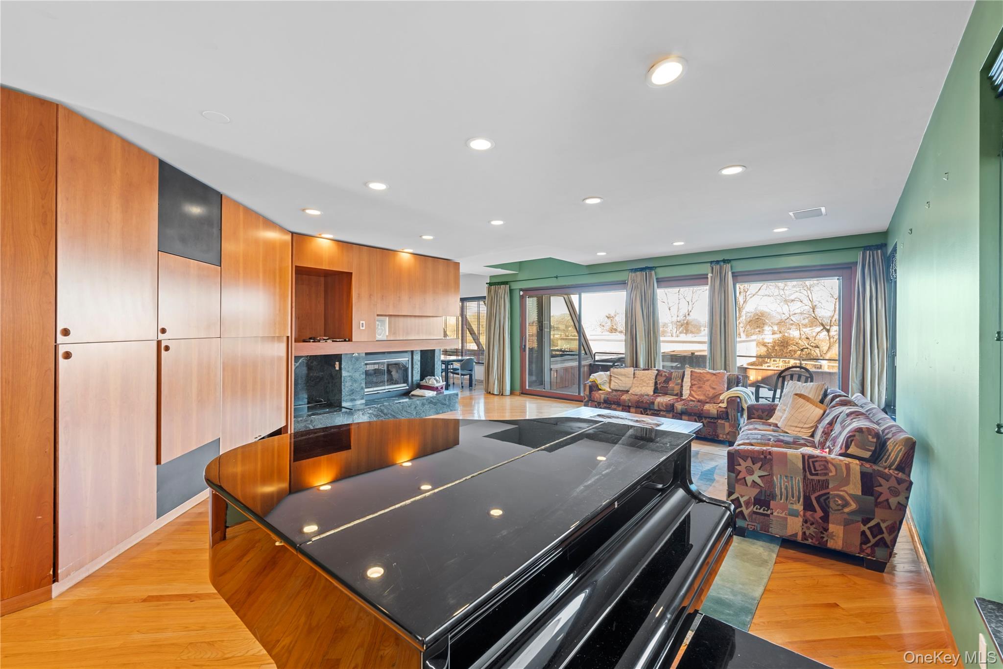 2829 Frankel Boulevard Merrick, NY 11566 - Photo 9 of 46 a large room with many windows