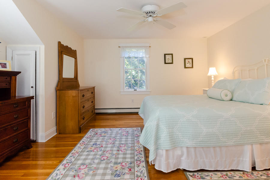 18 Register Road Marion, MA 02738 - Photo 20 of 30 a bedroom with a bed and a window