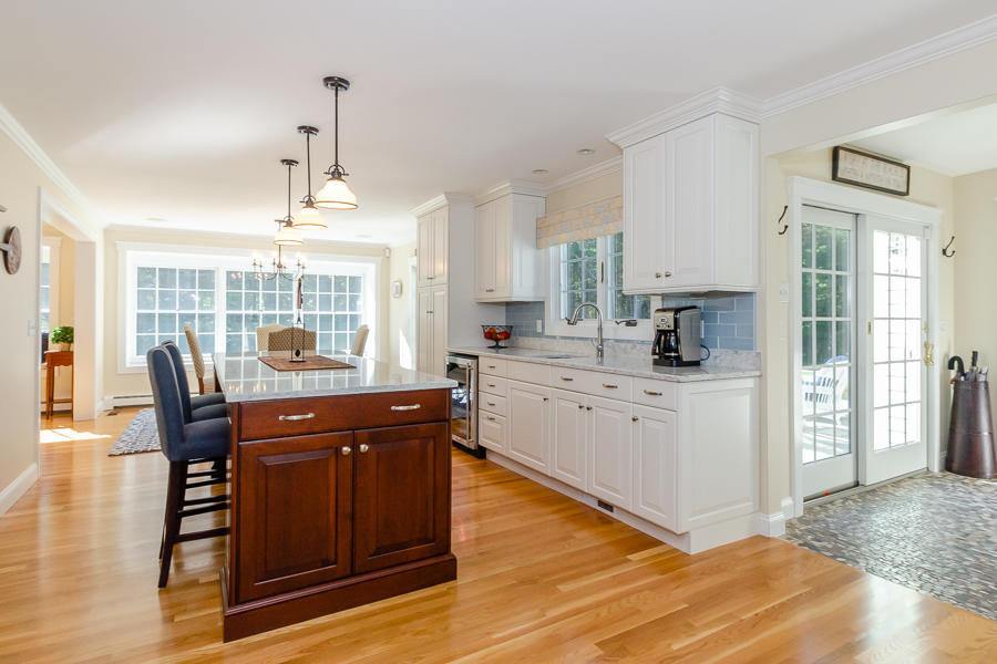 18 Register Road Marion, MA 02738 - Photo 6 of 30 a kitchen with stainless steel appliances granite countertop a stove and a refrigerator