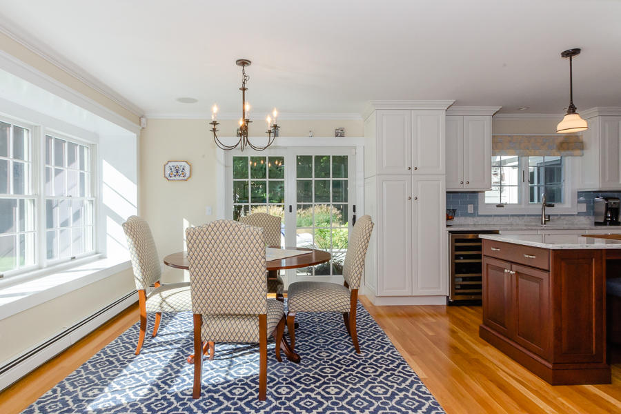 18 Register Road Marion, MA 02738 - Photo 7 of 30 a dining room with furniture a chandelier and wooden floor