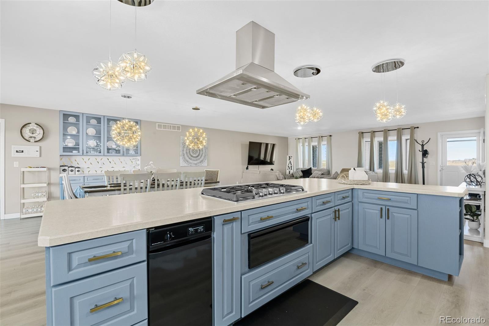 5330 Kiowa-Bennett Road Bennett, CO 80102 - Photo 14 of 50 a kitchen with a stove and cabinets