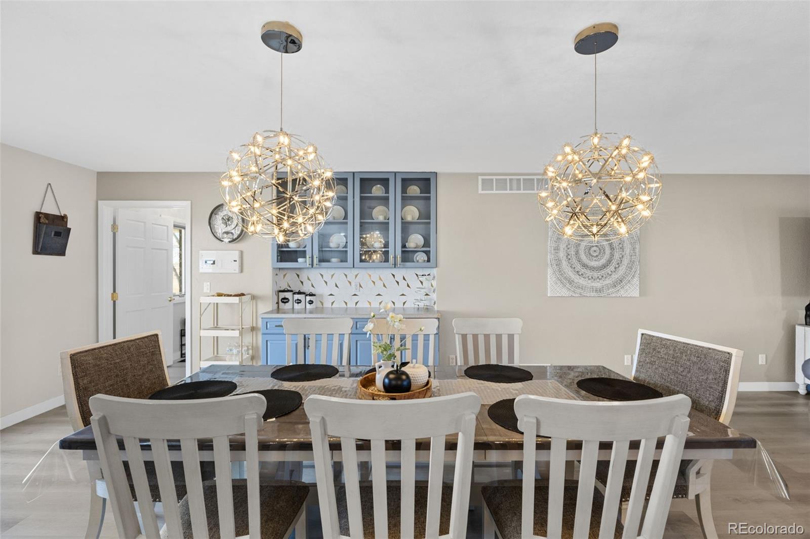 5330 Kiowa-Bennett Road Bennett, CO 80102 - Photo 17 of 50 a view of a dining room and chandelier