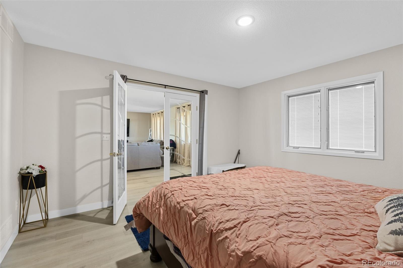 5330 Kiowa-Bennett Road Bennett, CO 80102 - Photo 21 of 50 a bedroom with a large bed and a closet