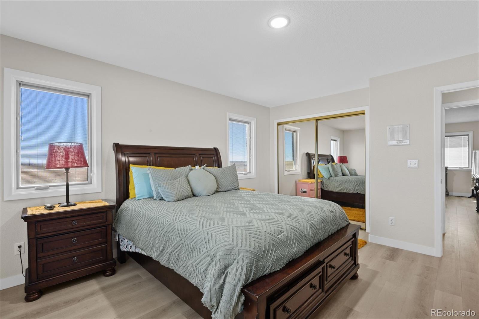 5330 Kiowa-Bennett Road Bennett, CO 80102 - Photo 27 of 50 a bedroom with a bed and a dresser