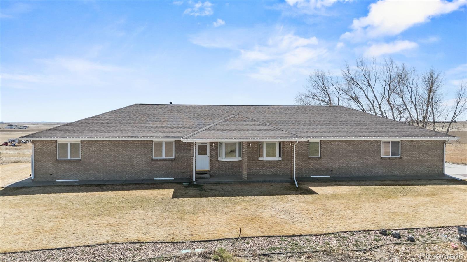 5330 Kiowa-Bennett Road Bennett, CO 80102 - Photo 3 of 50 front view of a house