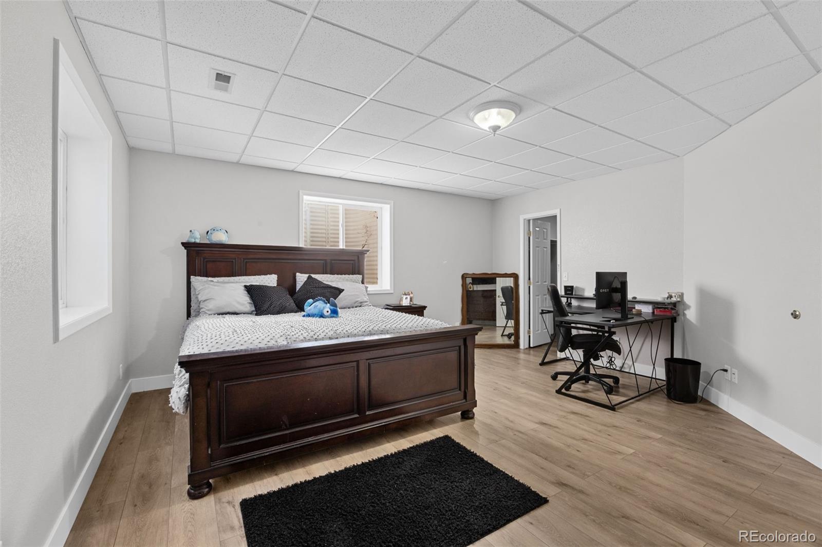 5330 Kiowa-Bennett Road Bennett, CO 80102 - Photo 40 of 50 a bedroom with furniture