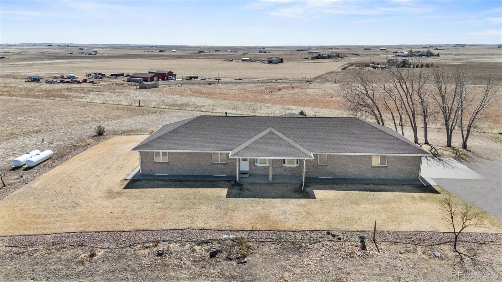 5330 Kiowa-Bennett Road Bennett, CO 80102 - Photo 47 of 50 a view of a terrace