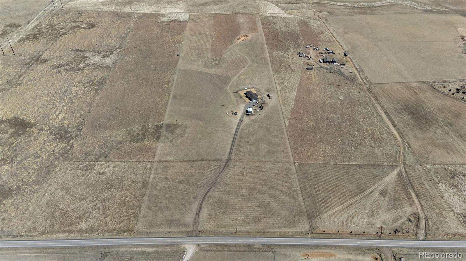 5330 Kiowa-Bennett Road Bennett, CO 80102 - Photo 50 of 50 a bathroom with a shower