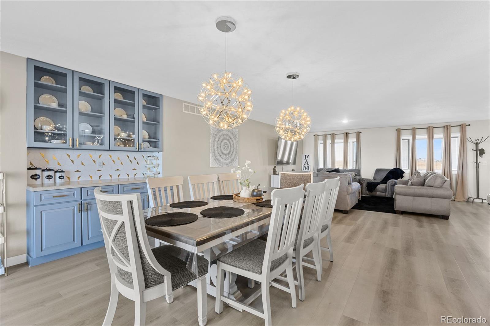 5330 Kiowa-Bennett Road Bennett, CO 80102 - Photo 9 of 48 a view of a dining room with furniture and chandelier