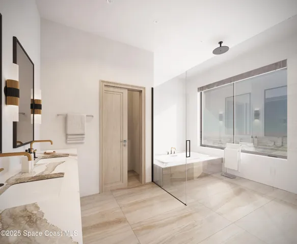 a large bathroom with a tub a sink and a large mirror