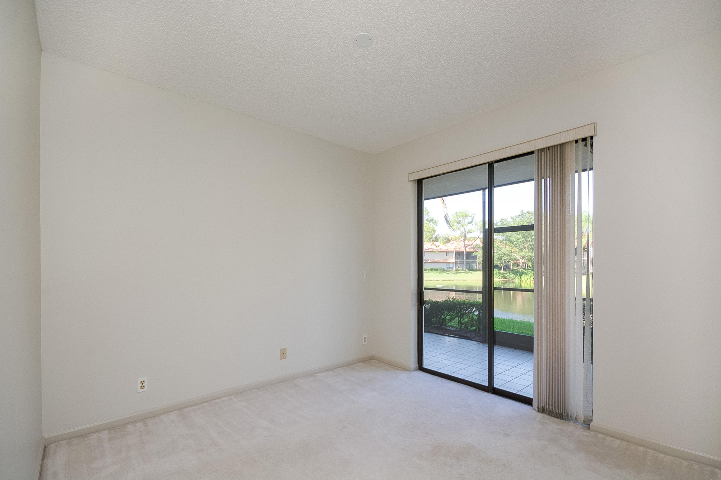 5791 Coach House Circle, Unit D Boca Raton, FL 33486 - Photo 14 of 20 Guest Bedroom 2
