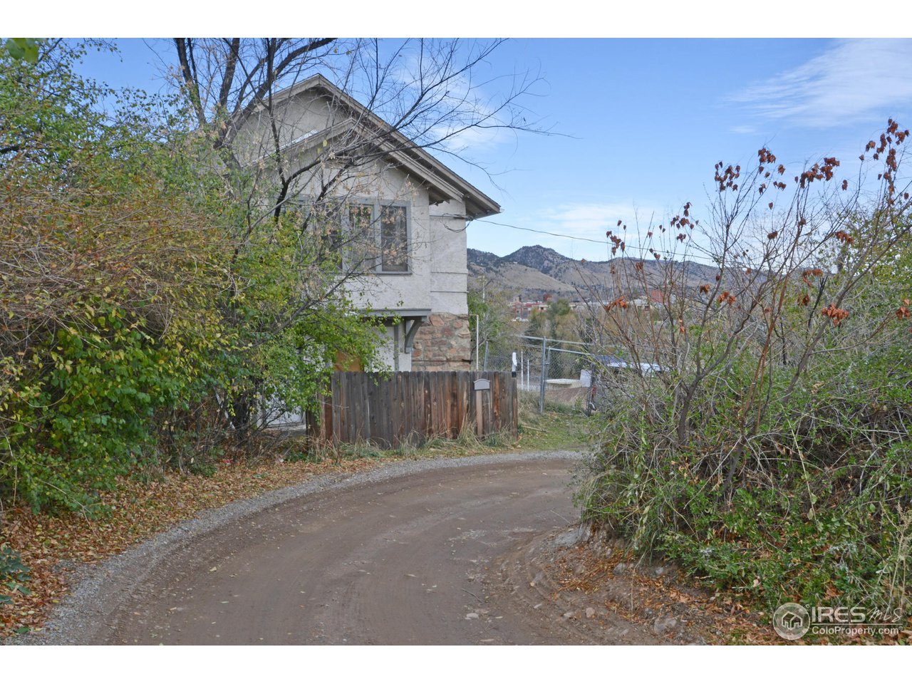 1590 Hillside Road Boulder, CO 80302 - Photo 11 of 25 a view of a backyard with a tree