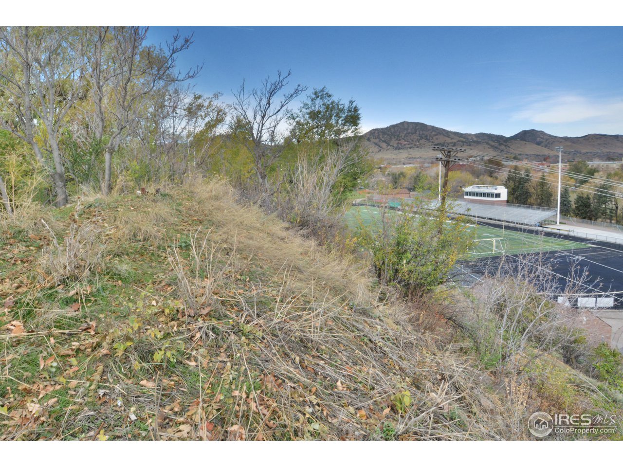 1590 Hillside Road Boulder, CO 80302 - Photo 16 of 25 a view of a lush green hillside and houses