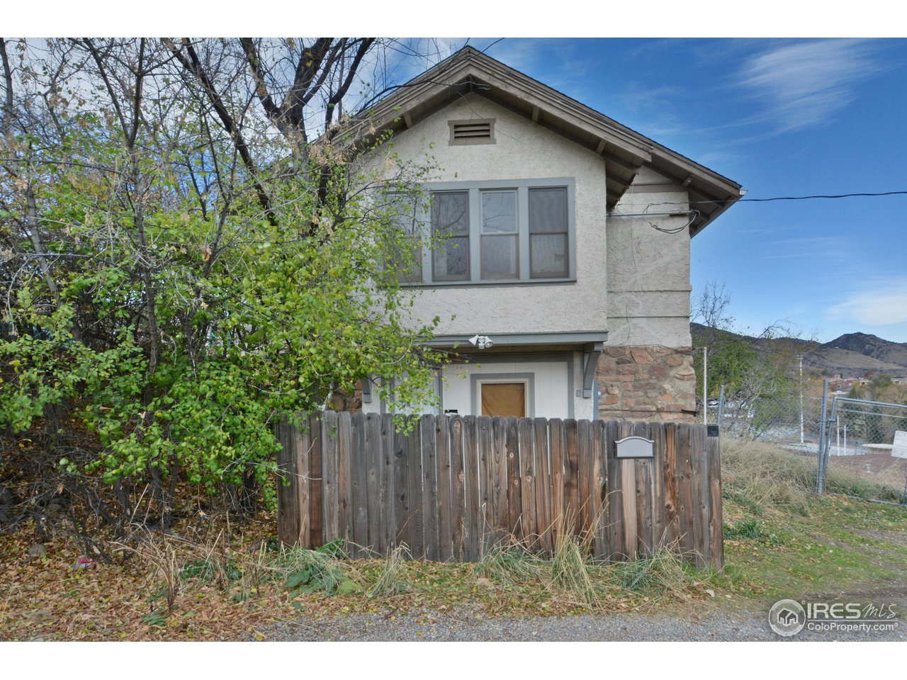 1590 Hillside Road Boulder, CO 80302 - Photo 6 of 25 a front view of a house with a yard