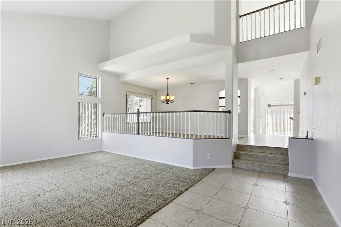 3692 River Canyon Road Las Vegas, NV 89129 - Photo 6 of 69 Entry foyer looks through the whole house.